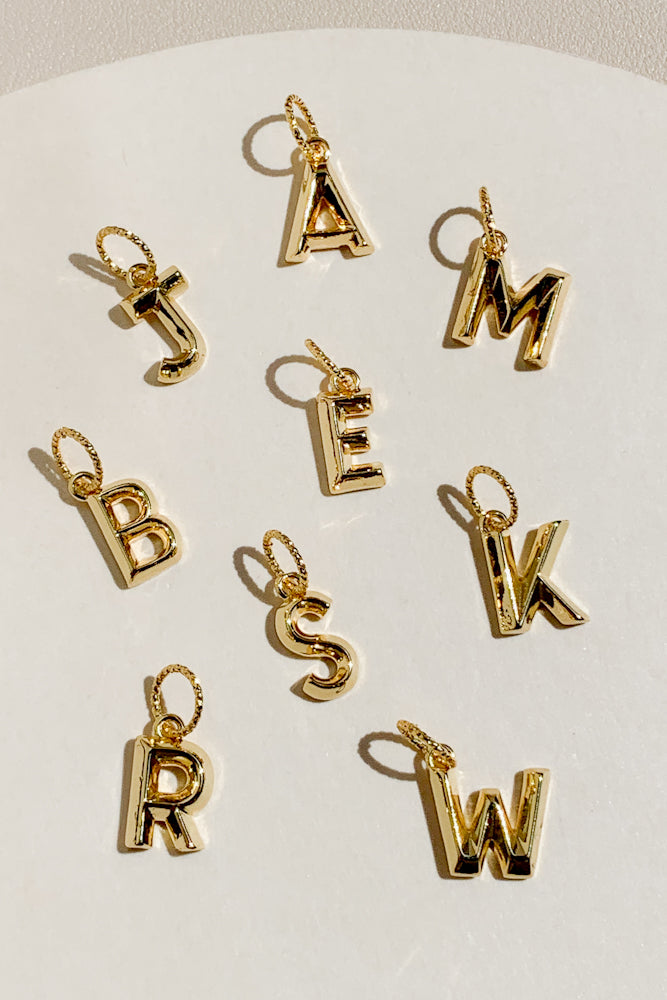 Raised Initial Charm