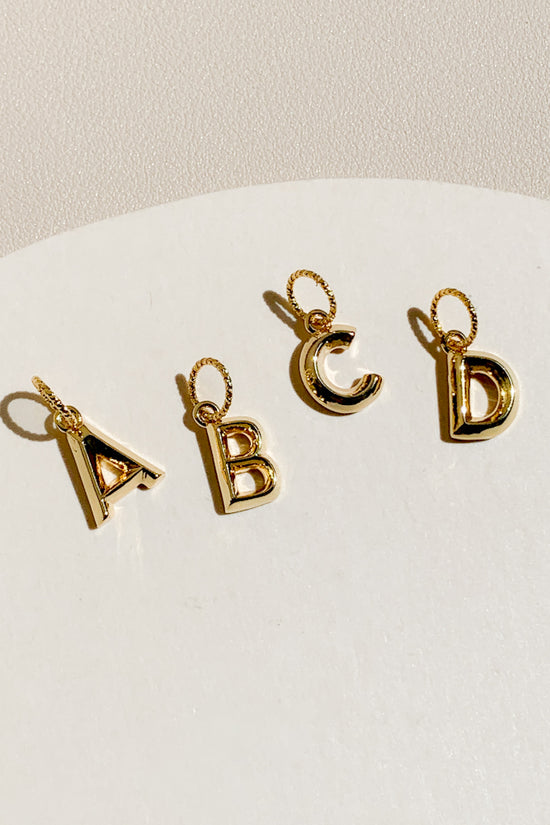 Raised Initial Charm