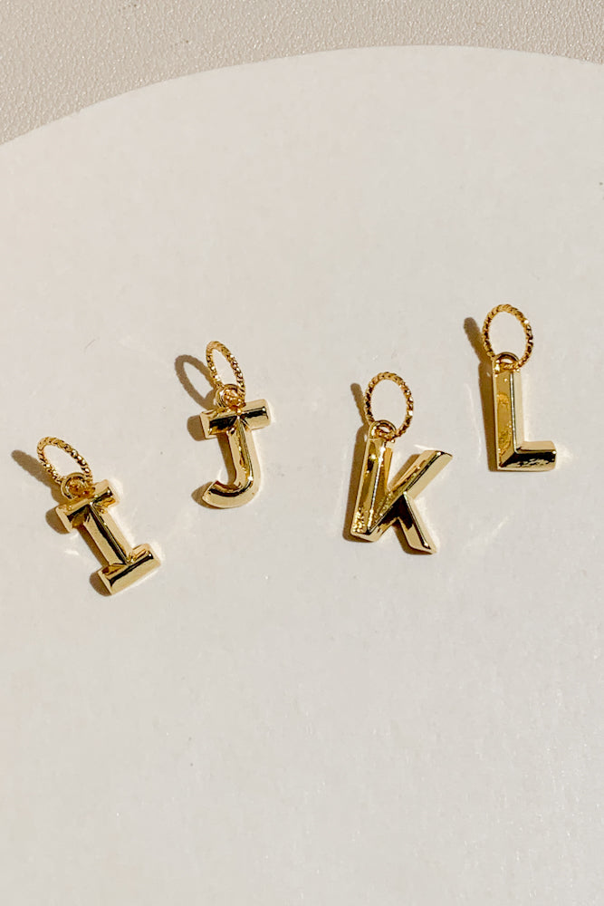 Raised Initial Charm